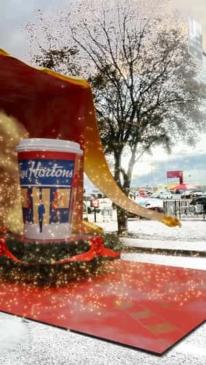 Giant Holiday Cups in a fake-out-of-home ad of Tim Hortons