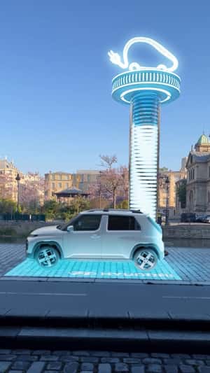 "Inster" Charge on Paris Cobblestone Street in a fake-out-of-home ad of Hyundai