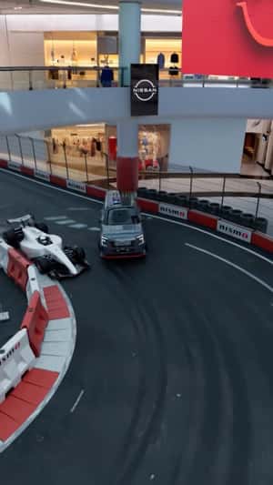 Race Track Installation at Dubai Mall in a fake-out-of-home ad of Nissan
