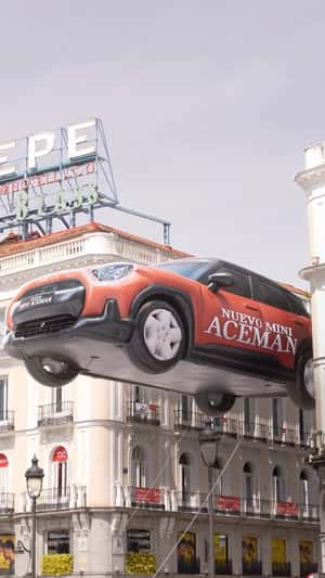 Giant "Aceman" Balloon in Puerta del Sol in a fake-out-of-home ad of MINI