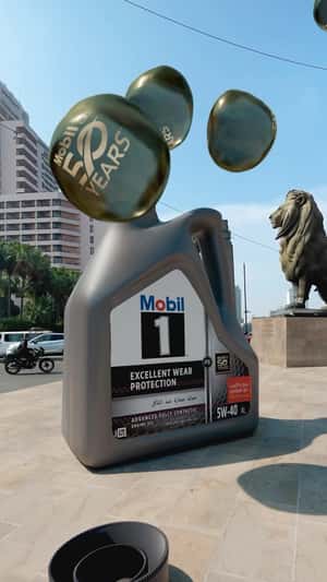 Massive Oil Droplets Released from Bottle in a fake-out-of-home ad of Mobil
