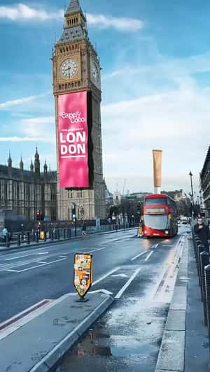 Giant Banner Hangs from Big Ben in a fake-out-of-home ad of Cape&Coco