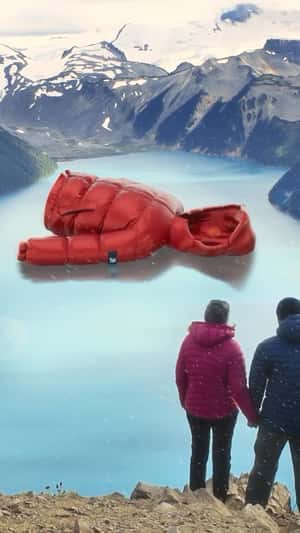 Red Jacket Slides at Frozen Lake in fake-out-of-home ad of Reserva