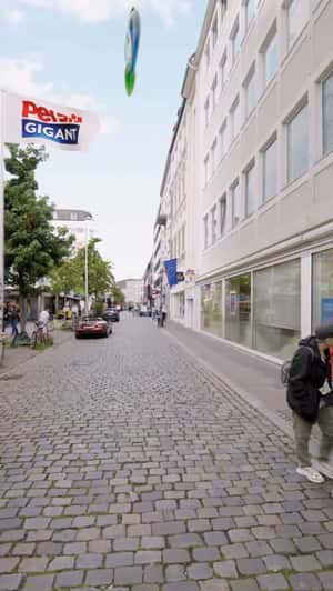 Giant "Persil" Disc Rolls Into Store in a fake-out-of-home ad of DM