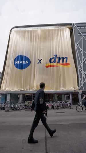 Giant Curtain Installation Teaser in a fake-out-of-home ad of DM