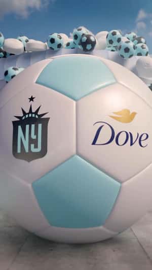 Giant Soaps and Soccer Balls Pop Out From Stadium in a fake-out-of-home ad of Dove