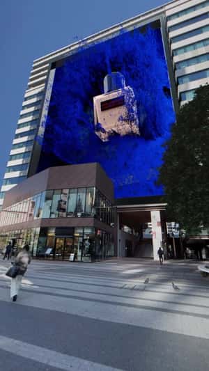 Blue Facade Reveals Giant Product in a fake-out-of-home ad of Shu Uemura 