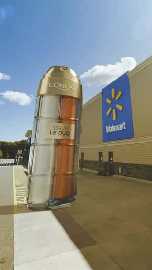 Giant Serum Bottle at Walmart in a fake-out-of-home ad of L'Oréal Paris 