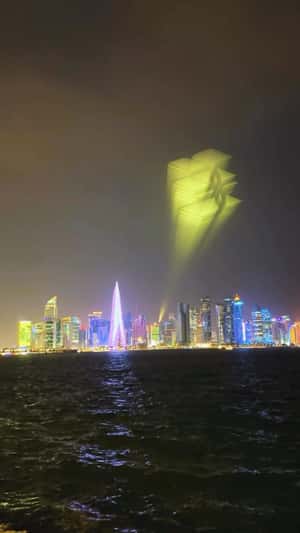 Sky Beam Over Doha in a fake-out-of-home ad of Gold Apple