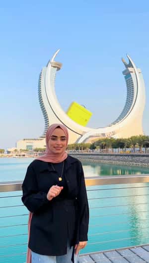 Giant Bag Glides at Katara Towers in a fake-out-of-home ad of Gold Apple