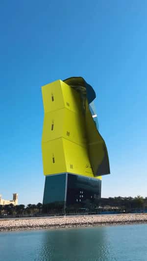 Giant Box Stacks in Zigzag Towers in a fake-out-of-home ad of Gold Apple