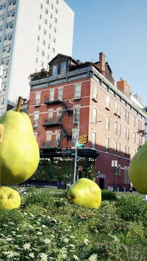 Giant Pears Fall at Pear Tree Corner in a fake-out-of-home ad of Kiehl's