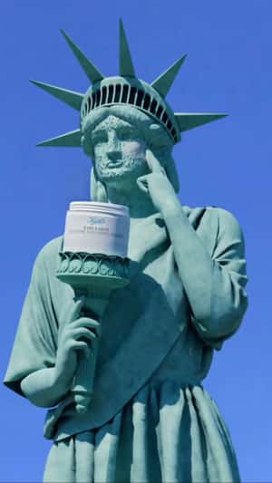 Statue of Liberty Applies Cream in a fake-out-of-home ad of Kiehl's