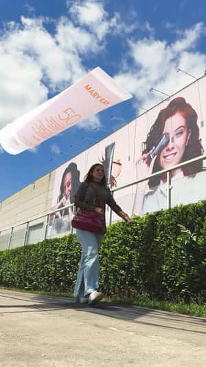 Giant Sunscreen Bottle Shades Women in a fake-out-of-home ad of Mary Kay 