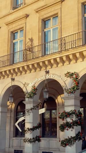 Paper Decorates Buildings in a fake-out-of-home ad of Maison Francis Kurkdjian