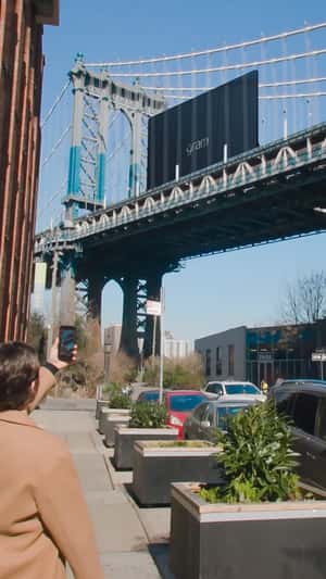 Giant Gram Pro Laptop in Manhattan Bridge fake out of home ad of LG