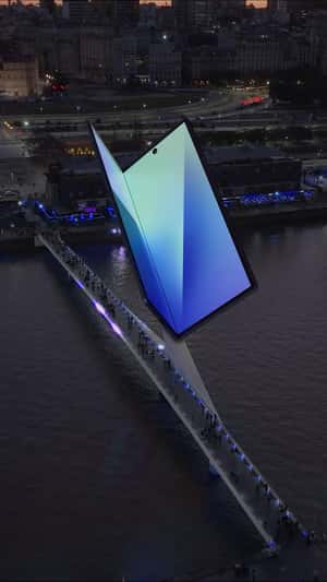 Giant Phone Unfolds on Puente de la Mujer in a fake-out-of-home ad of Samsung