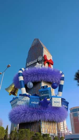 Tower Turns to Christmas Tree in fake-out-of-home ad of Allianz
