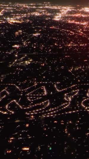 Logo Formed by Los Angeles City Lights in a fake-out-of-home ad of Amiri