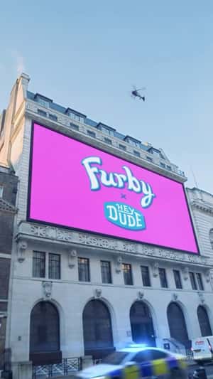 Furby Billboard on Building Facade in a fake-out-of-home ad of Hey Dude