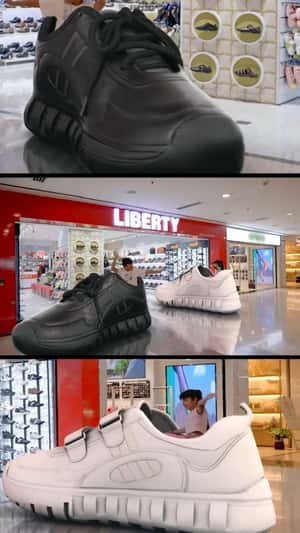 Kids Ride Giant Sneakers in a fake-out-of-home ad of Liberty Shoes