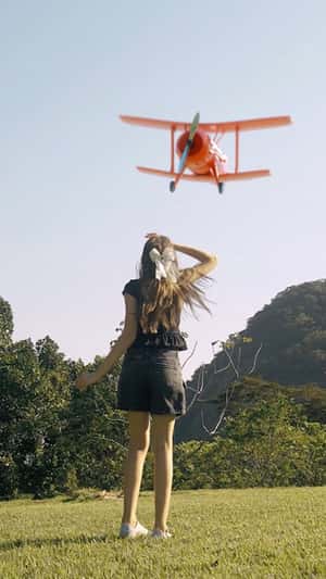 Kids Play With Giant Toys On Field in a fake-out-of-home ad of Renner