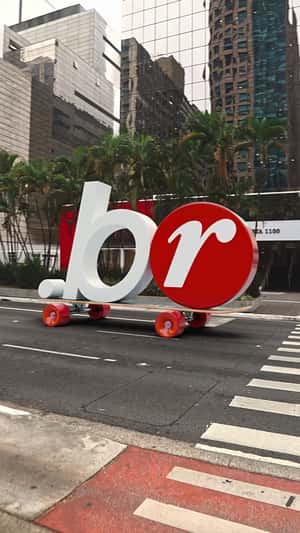 Large BR Skateboards Through the City in a fake-out-of-home ad of Renner