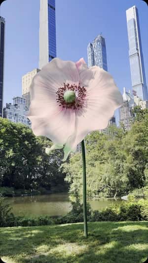 Prada Flower Blooms in fake-out-of-home ad of L’Oréal Groupe