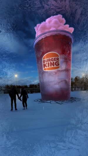 Giant Cup Crashes on Skating Rink in a fake-out-of-home ad of Burger King 