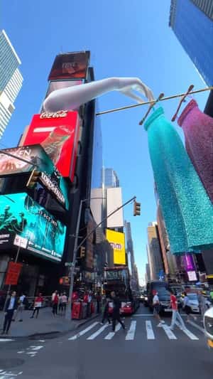 Giant Hand Pops Out of Billboard in a fake-out-of-home ad of Oh Polly