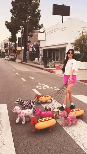 Stylized Dogs Cross Street in a fake-out-of-home ad of Victoria Secret PINK 