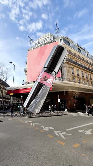 Lipstick and Heart Balloons in fake-out-of-home ad of L’Oréal Groupe