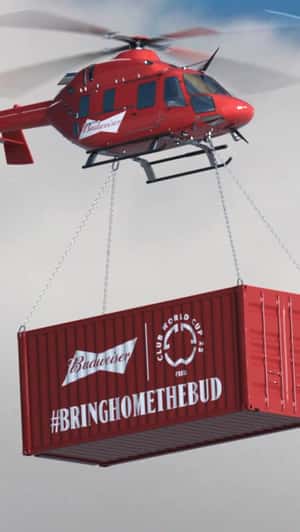 Helicopters Airlift Boxcars Over Tower Bridge in a fake-out-of-home ad of Budweiser 