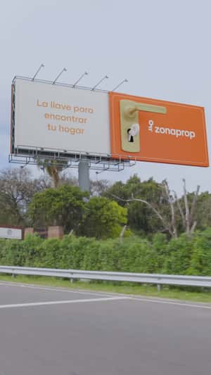 Giant Key Unveils Message on Billboard in a fake-out-of-home ad of Zonaprop 
