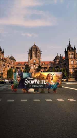 Dwarves Carry Snow White Ad in a fake-out-of-home ad of Walt Disney Studios 
