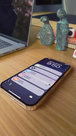 Notifications Pop Out of Phone in a fake-out-of-home ad of Marie Claire