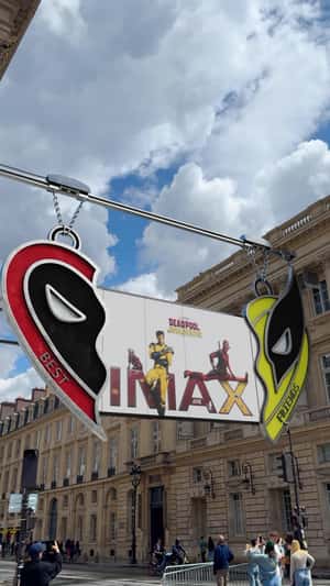 Deadpool and Wolverine Giant Heart Keychain in a fake-out-of-home ad of Marvel