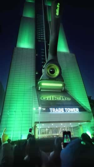 Giant Razor Slides Down Trade Tower in a fake-out-of-home ad of Vogue