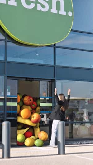 Giant Fruits Overflow Store Entrance in a fake-out-of-home ad of fresh.