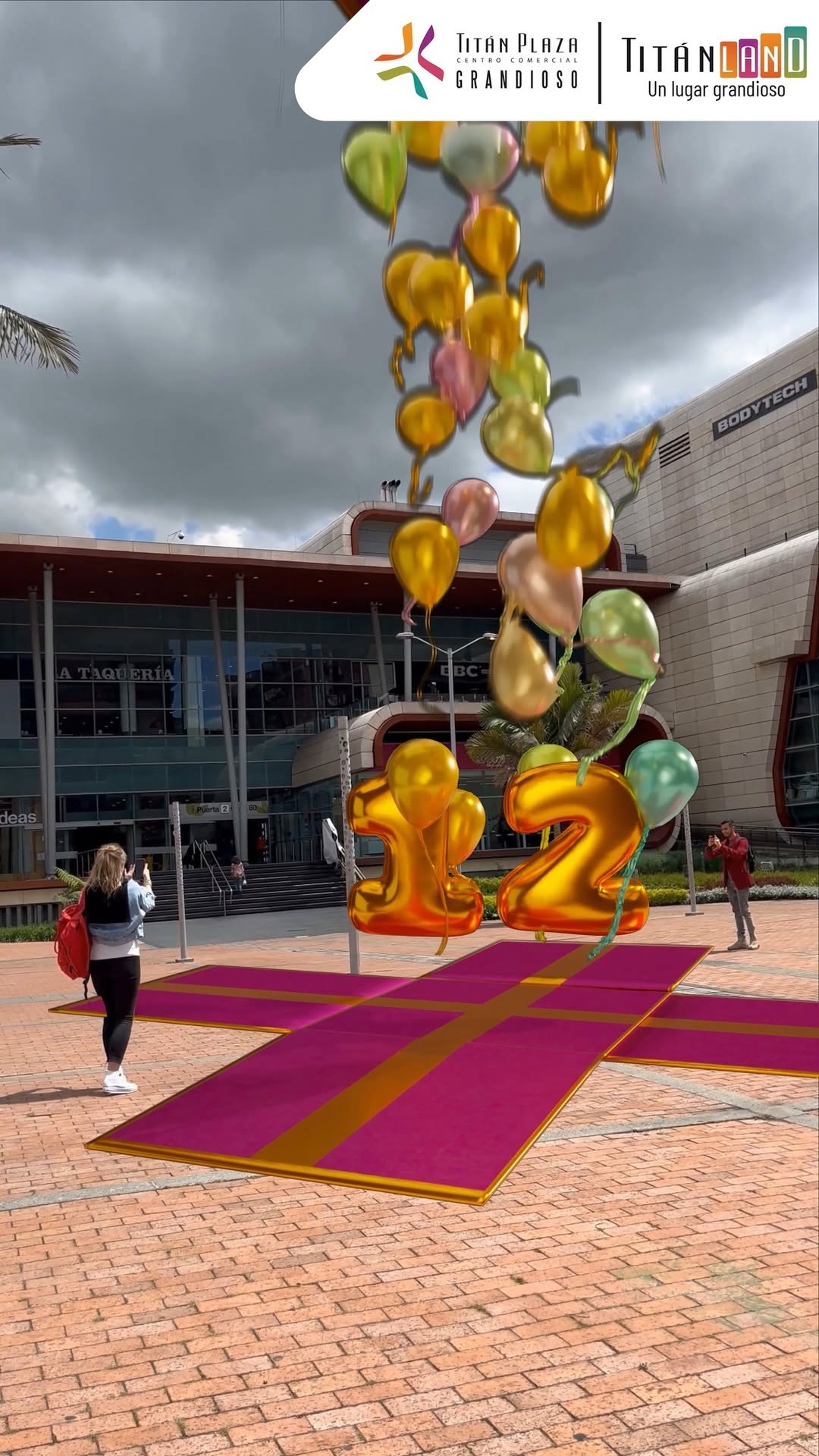 Helicopter Delivers Giant Gift Box in a fake-out-of-home ad of Titan Plaza 