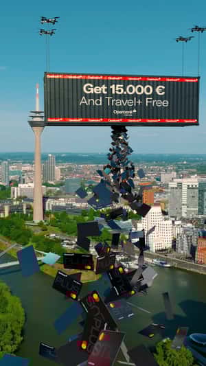 Boxcar Lifted by Drones Releases Cards in a fake-out-of-home ad of Openbank 