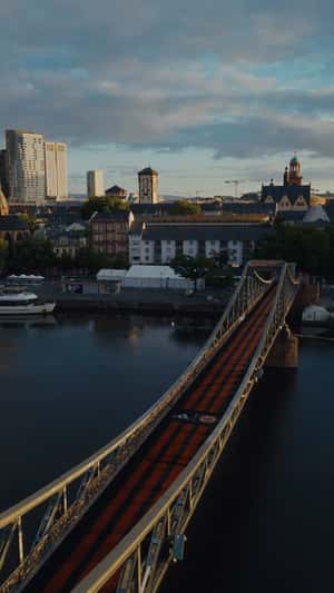 Eiserner Steg Painted with Red Stripes in a fake-out-of-home ad of Adidas