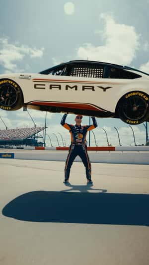 Race Car Drivers Show Off Stunts at Darlington Raceway in a fake-out-of-home ad of NASCAR