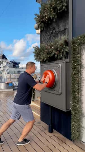 Red Buttons Activate Christmas Decors in a fake-out-of-home ad of MSC Cruises