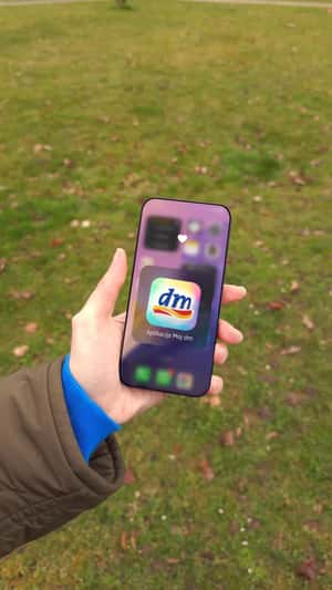 Inflatable Store Emerges From Phone in a fake-out-of-home ad of DM