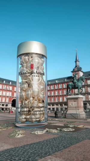 Massive Bottle in Plaza Mayor in a fake-out-of-home ad of Elizabeth Arden