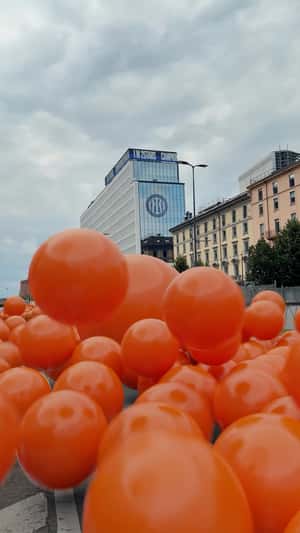 Orange Balls Rolling in the Streets in Fake-out-of-home ad of Inter