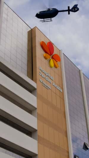 Helicopter Places Logo on Hospital Facade in a fake-out-of-home ad of Hapvida