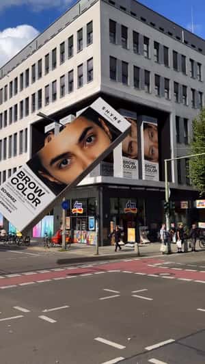 Model from Brow Color Box Blinks in a fake-out-of-home ad of Shyne