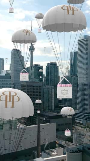 Bouquet Boxes Float Over City in a fake-out-of-home ad of Prairies & Petals 